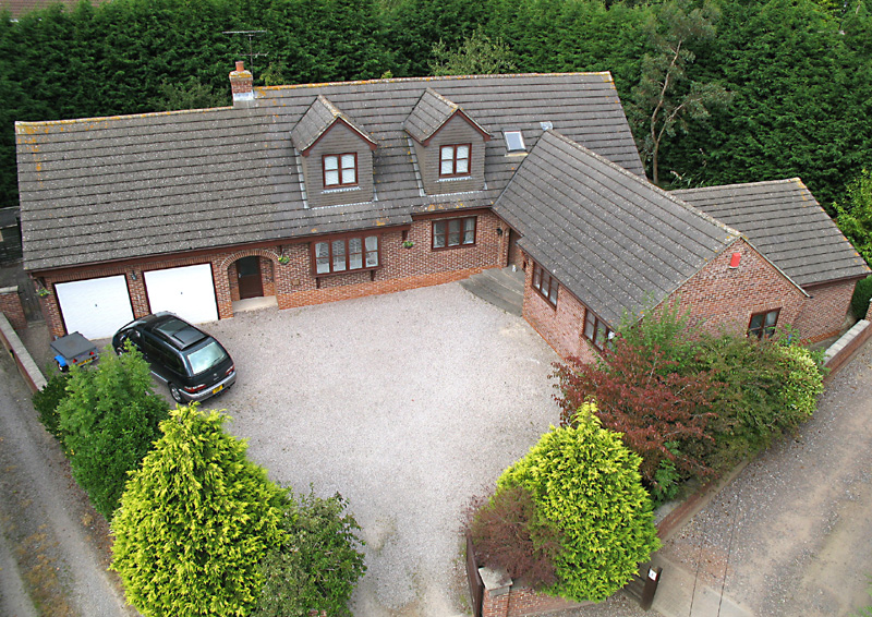 Mast Photography - bungalow with drive